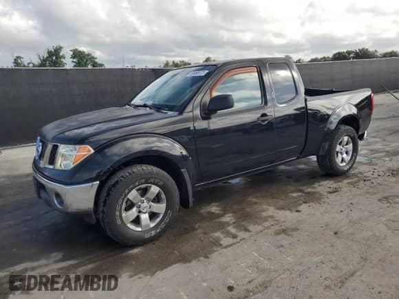 2005 Nissan Frontier SE z VIN 1N6AD06U75C448435, wystawiony jako Copart lot #85896125 z przebiegiem 193 360 mil mil oraz Szkoda całkowita • Salvage title. Historia ofert i sprzedaży dostępna na DreamBid. Obrazek 1.