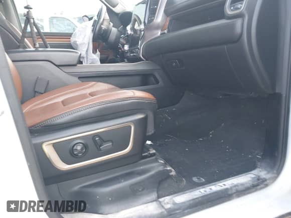 2020 Ram 1500 Longhorn with VIN 1C6SRFKT0LN127449, listed as a IAAI auction lot 42246252 with 52,034 mi miles and . Bid and sale history available at DreamBid. Image 5.