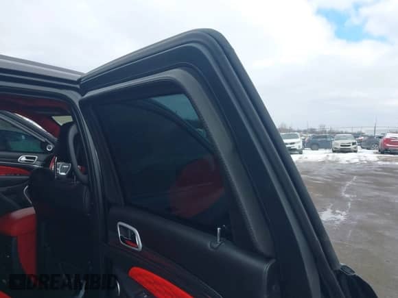 2021 Jeep Grand Cherokee SRT with VIN 1C4RJFDJ7MC559608, listed as a IAAI auction lot 41379028 with 18,464 mi miles and . Bid and sale history available at DreamBid. Image 19.