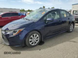 2021 Toyota Corolla LE with VIN JTDEPMAE9MJ180128, listed as a Copart auction lot 81996935 with 76,596 mi miles and Salvage title. Bid and sale history available at DreamBid. Image 1.