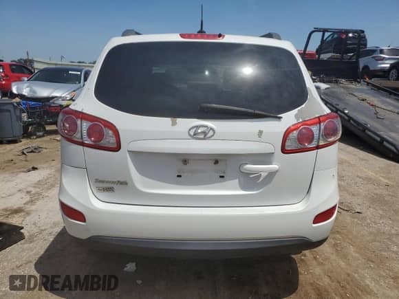 2012 Hyundai Santa Fe GLS z VIN 5XYZG3AB5CG165724, wystawiony jako Copart lot #65202865 z przebiegiem 149 352 mil mil oraz Czysty tytuł • Clean title. Historia ofert i sprzedaży dostępna na DreamBid. Obrazek 6.