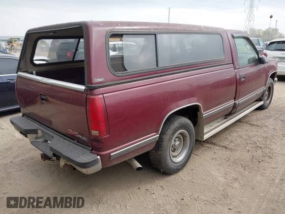 1996 GMC Sierra 1500 with VIN 1GTEC14R3TE521264, listed as a IAAI auction lot 43445138 with 104,184 mi miles and . Bid and sale history available at DreamBid. Image 4.