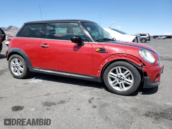 2011 MINI Hardtop with VIN WMWSU3C5XBT093162, listed as a Copart auction lot 54871315 with 171,220 mi miles and Salvage title. Bid and sale history available at DreamBid. Image 4.
