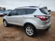 2018 Ford Escape SE with VIN 1FMCU9GD2JUB39549, listed as a Copart auction lot 84175385 with 127,811 mi miles and Salvage title. Bid and sale history available at DreamBid. Image 2.