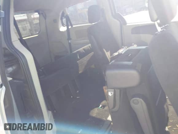 2014 Dodge Grand Caravan SXT with VIN 2C4RDGCG1ER347556, listed as a IAAI auction lot 43221709 with 245,875 mi miles and . Bid and sale history available at DreamBid. Image 8.