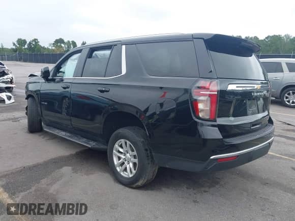2021 Chevrolet Tahoe LT z VIN 1GNSCNKD5MR266166, wystawiony jako IAAI lot #42921471 z przebiegiem 99 800 mil mil oraz . Historia ofert i sprzedaży dostępna na DreamBid. Obrazek 3.