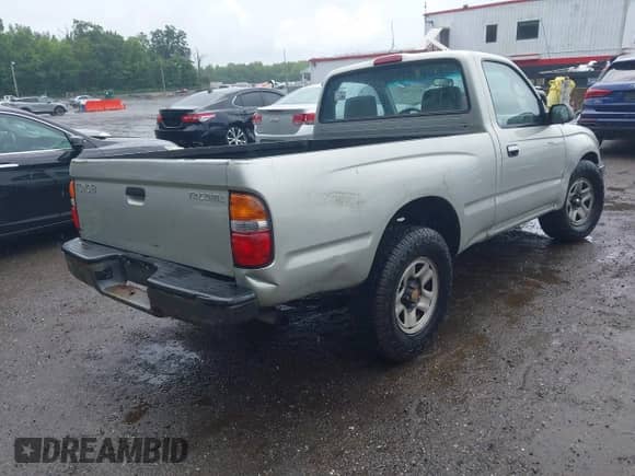 2001 Toyota Tacoma z VIN 5TENL42N41Z795150, wystawiony jako IAAI lot #42657291 z przebiegiem 288 053 mil mil oraz . Historia ofert i sprzedaży dostępna na DreamBid. Obrazek 4.