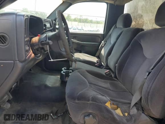 2001 GMC Sierra 1500 SL with VIN 1GTEC14W21Z187496, listed as a Copart auction lot 63243275 with 251,682 mi miles and Salvage title. Bid and sale history available at DreamBid. Image 7.
