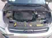 2014 Ford Escape SE z VIN 1FMCU0GX5EUA21457, wystawiony jako IAAI lot #43370908 z przebiegiem 143 709 mil mil oraz . Historia ofert i sprzedaży dostępna na DreamBid. Obrazek 10.