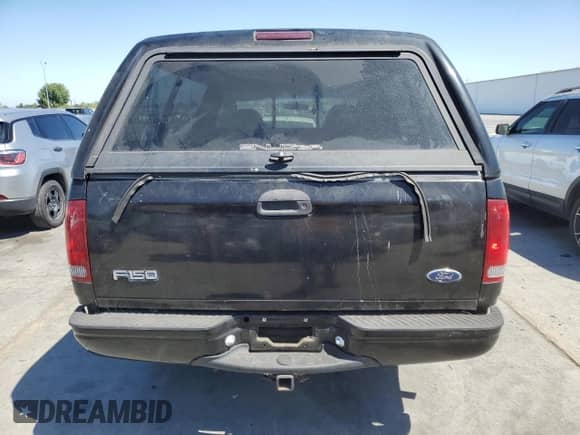 2003 Ford F-150 XL с VIN 1FTRF17W73NA55543, выставлен на аукционе Copart как лот 66516465 с пробегом 141 097 миль миль и Списание • Salvage title. История ставок и продаж доступна на DreamBid. Изображение 6.