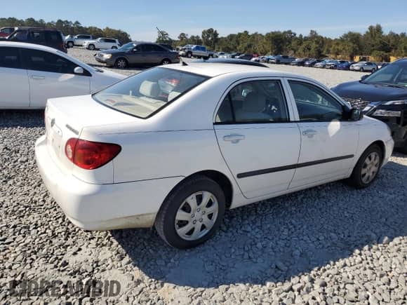 2004 Toyota Corolla CE with VIN JTDBR32E142042261, listed as a Copart auction lot 90053425 with 299,999 mi miles and Clean title. Bid and sale history available at DreamBid. Image 3.
