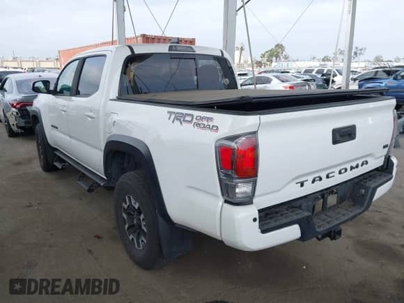 2021 Toyota Tacoma SR5 with VIN 5TFAZ5CN4MX111100, listed as a IAAI auction lot 42570230 with 54,460 mi miles and . Bid and sale history available at DreamBid. Image 3.