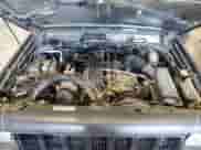 1998 Jeep Grand Cherokee with VIN 1J4FJ27P2WL203592, listed as a Copart auction lot 82803884 with 82,604 mi miles and Salvage title. Bid and sale history available at DreamBid. Image 11.