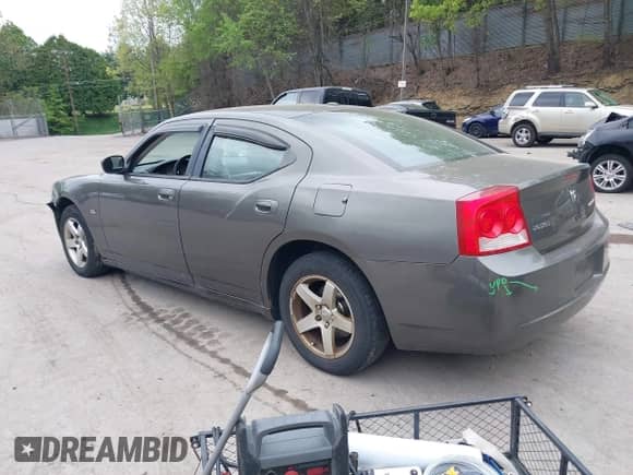2010 Dodge Charger 3.5L with VIN 2B3CA2CV0AH251239, listed as a IAAI auction lot 42244252 with 168,138 mi miles and . Bid and sale history available at DreamBid. Image 3.