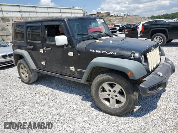 2008 Jeep Wrangler Unlimited Rubicon z VIN 1J4GA69188L554885, wystawiony jako Copart lot #66493815 z przebiegiem 251 746 mil mil oraz Szkoda całkowita • Salvage title. Historia ofert i sprzedaży dostępna na DreamBid. Obrazek 4.