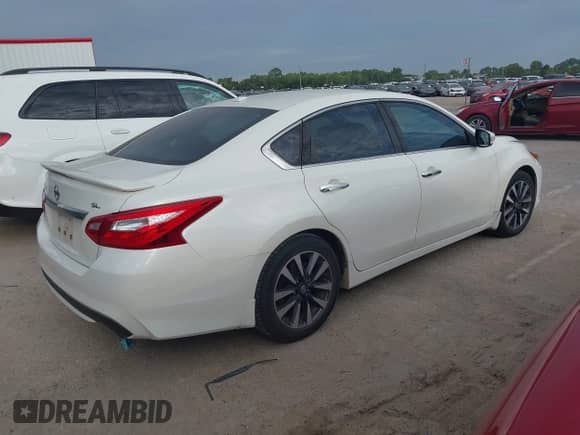 2016 Nissan Altima S with VIN 1N4AL3AP1GC266179, listed as a IAAI auction lot 43303035 with 96,373 mi miles and . Bid and sale history available at DreamBid. Image 4.