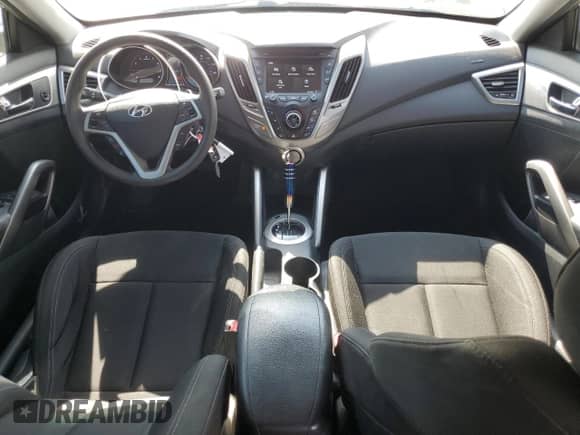 2013 Hyundai Veloster w/Black Int z VIN KMHTC6AD0DU094688, wystawiony jako Copart lot #87237165 z przebiegiem 81 433 mil mil oraz Szkoda całkowita • Salvage title. Historia ofert i sprzedaży dostępna na DreamBid. Obrazek 8.