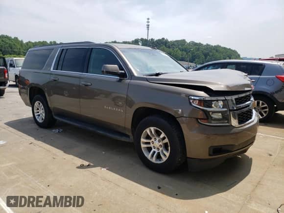 2015 Chevrolet Suburban LS с VIN 1GNSCHKC8FR628406, выставлен на аукционе Copart как лот 60682805 с пробегом 195 151 миль миль и Списание • Salvage title. История ставок и продаж доступна на DreamBid. Изображение 4.