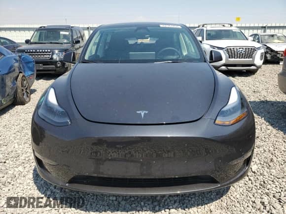 2024 Tesla Model Y Long Range with VIN 7SAYGDEE1RF064558, listed as a Copart auction lot 62367204 with 2,706 mi miles and Salvage title. Bid and sale history available at DreamBid. Image 5.