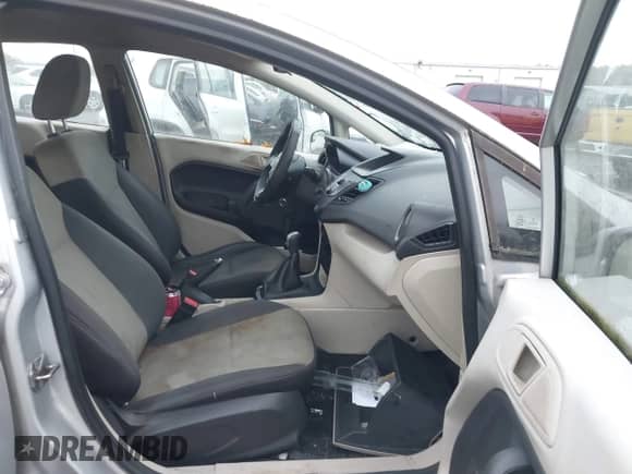 2013 Ford Fiesta S with VIN 3FADP4AJ7DM191498, listed as a IAAI auction lot 43445206 with 165,406 mi miles and . Bid and sale history available at DreamBid. Image 5.