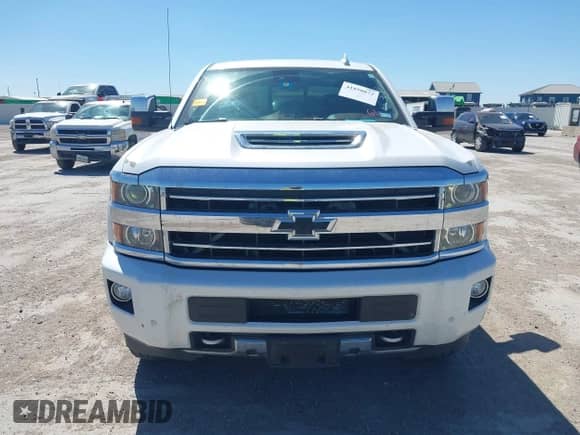 2019 Chevrolet Silverado 2500HD High Country z VIN 1GC1KUEY8KF171437, wystawiony jako IAAI lot #41850872 z przebiegiem 114 027 mil mil oraz . Historia ofert i sprzedaży dostępna na DreamBid. Obrazek 12.