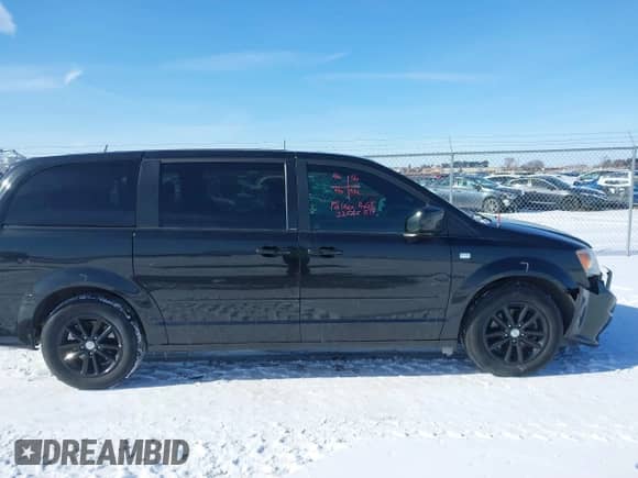 2014 Dodge Grand Caravan SXT with VIN 2C4RDGBGXER226395, listed as a IAAI auction lot 41561208 with 174,781 mi miles and . Bid and sale history available at DreamBid. Image 13.