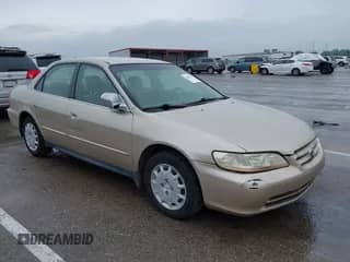 2002 Honda Accord LX with VIN JHMCG56402C025464, listed as a IAAI auction lot 42458693 with 257,711 mi miles and . Bid and sale history available at DreamBid. Image 1.