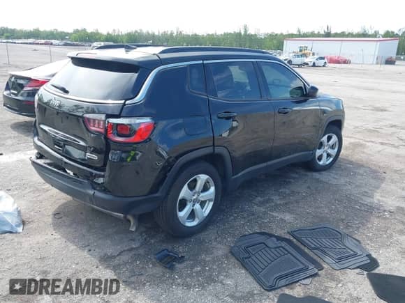 2020 Jeep Compass Latitude with VIN 3C4NJCBB5LT235035, listed as a IAAI auction lot 42659491 with 60,535 mi miles and . Bid and sale history available at DreamBid. Image 4.