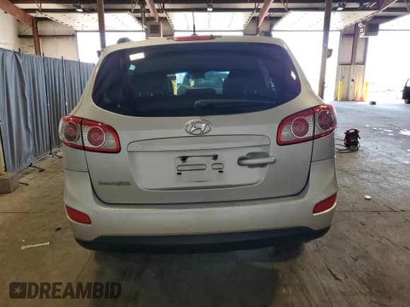 2012 Hyundai Santa Fe GLS z VIN 5XYZG3AB1CG113698, wystawiony jako Copart lot #71229884 z przebiegiem 252 820 mil mil oraz Szkoda całkowita • Salvage title. Historia ofert i sprzedaży dostępna na DreamBid. Obrazek 6.