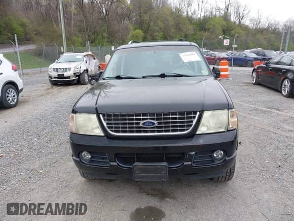 2003 Ford Explorer Limited z VIN 1FMDU75W23UC01032, wystawiony jako IAAI lot #41922485 z przebiegiem 318 766 mil mil oraz . Historia ofert i sprzedaży dostępna na DreamBid. Obrazek 12.