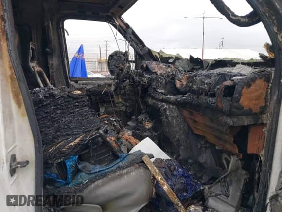 2007 Ford Econoline Cargo Commercial z VIN 1FTNS24W27DA64747, wystawiony jako IAAI lot #41915659 z przebiegiem Nie podano mil oraz . Historia ofert i sprzedaży dostępna na DreamBid. Obrazek 5.