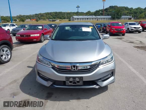 2016 Honda Accord Touring with VIN 1HGCR3F97GA031715, listed as a IAAI auction lot 43144733 with Not provided miles and . Bid and sale history available at DreamBid. Image 12.