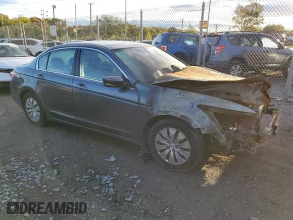 2012 Honda Accord LX z VIN 1HGCP2F32CA165232, wystawiony jako Copart lot #87259345 z przebiegiem Nie podano mil oraz Szkoda całkowita • Salvage title. Historia ofert i sprzedaży dostępna na DreamBid. Obrazek 4.