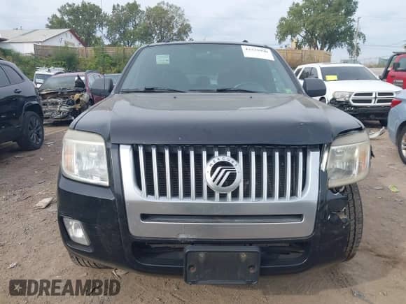2008 Mercury Mariner with VIN 4M2CU91108KJ51427, listed as a IAAI auction lot 43339990 with 227,044 mi miles and . Bid and sale history available at DreamBid. Image 12.