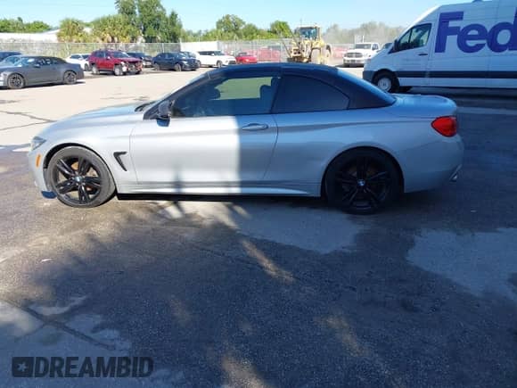 2017 BMW 4 Series 430i with VIN WBA4U7C32H5J54919, listed as a IAAI auction lot 43476761 with 142,232 mi miles and . Bid and sale history available at DreamBid. Image 14.