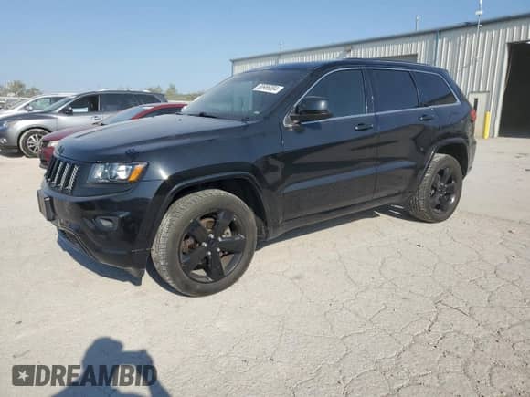 2015 Jeep Grand Cherokee Altitude with VIN 1C4RJFAG0FC742506, listed as a Copart auction lot 68986094 with 101,564 mi miles and Salvage title. Bid and sale history available at DreamBid. Image 1.