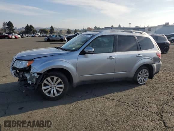 2012 Subaru Forester X Touring с VIN JF2SHAHC5CH415232, выставлен на аукционе Copart как лот 84522724 с пробегом 133 062 миль миль и Списание • Salvage title. История ставок и продаж доступна на DreamBid. Изображение 1.
