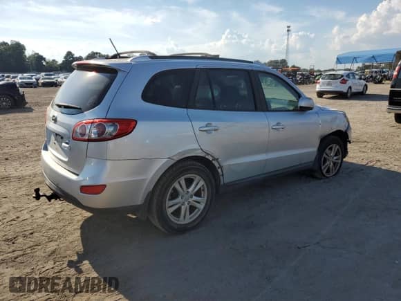 2012 Hyundai Santa Fe SE с VIN 5XYZH4AG7CG102932, выставлен на аукционе Copart как лот 71500305 с пробегом 154 758 миль миль и Списание • Salvage title. История ставок и продаж доступна на DreamBid. Изображение 3.