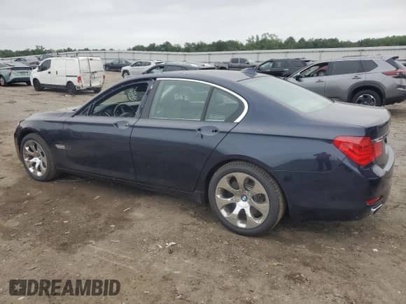 2012 BMW 7 Series 750i xDrive with VIN WBAKC6C52CDX99493, listed as a Copart auction lot 69933035 with 117,809 mi miles and Salvage title. Bid and sale history available at DreamBid. Image 2.