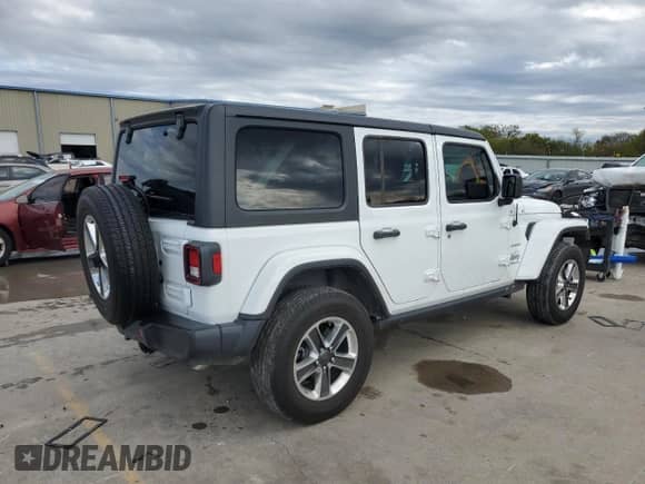 2023 Jeep Wrangler Sahara Altitude with VIN 1C4HJXEG5PW570629, listed as a Copart auction lot 80860234 with 15,121 mi miles and Salvage title. Bid and sale history available at DreamBid. Image 3.