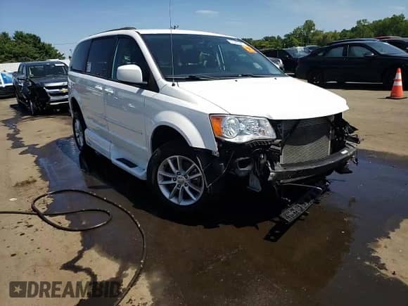 2016 Dodge Grand Caravan SXT with VIN 2C4RDGCG8GR335097, listed as a Copart auction lot 67926545 with 30,818 mi miles and Salvage title. Bid and sale history available at DreamBid. Image 15.