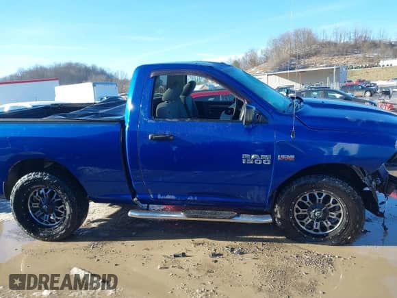 2014 Ram 1500 Express z VIN 3C6JR7AT0EG221829, wystawiony jako IAAI lot #41422092 z przebiegiem 100 000 mil mil oraz . Historia ofert i sprzedaży dostępna na DreamBid. Obrazek 12.