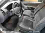 2002 Hyundai Accent z VIN KMHCF35G82U192732, wystawiony jako Copart lot #85187074 z przebiegiem 224 194 mil mil oraz Czysty tytuł • Clean title. Historia ofert i sprzedaży dostępna na DreamBid. Obrazek 7.