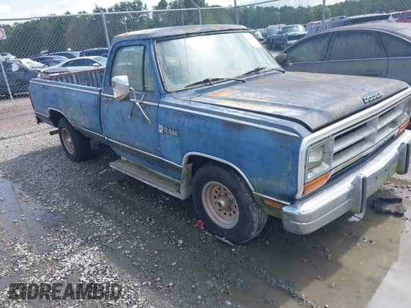 1987 Dodge Trucks with VIN 1B7HD14T3HS523739, listed as a IAAI auction lot 42426820 with 33,691 mi miles and . Bid and sale history available at DreamBid. Image 1.