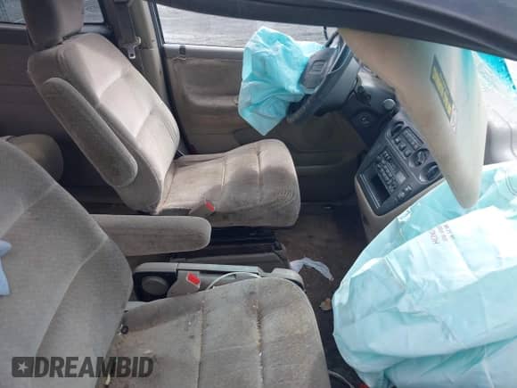 1999 Honda Odyssey LX with VIN 2HKRL1857XH511268, listed as a IAAI auction lot 41980209 with 143,521 mi miles and . Bid and sale history available at DreamBid. Image 5.