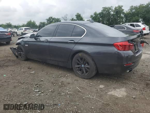 2014 BMW 5 Series 528i xDrive with VIN WBA5A7C5XED613582, listed as a Copart auction lot 63978595 with 121,621 mi miles and Salvage title. Bid and sale history available at DreamBid. Image 2.