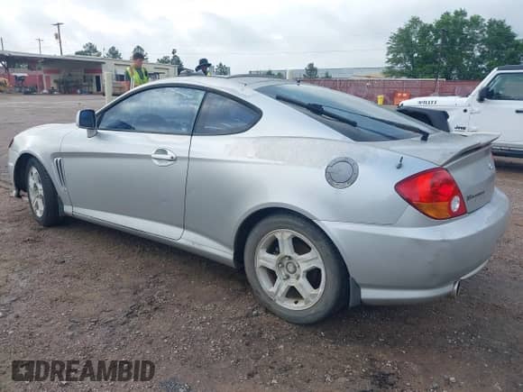 2003 Hyundai Tiburon GT с VIN KMHHN65F63U036899, выставлен на аукционе IAAI как лот 42148935 с пробегом 203 485 миль миль и . История ставок и продаж доступна на DreamBid. Изображение 3.