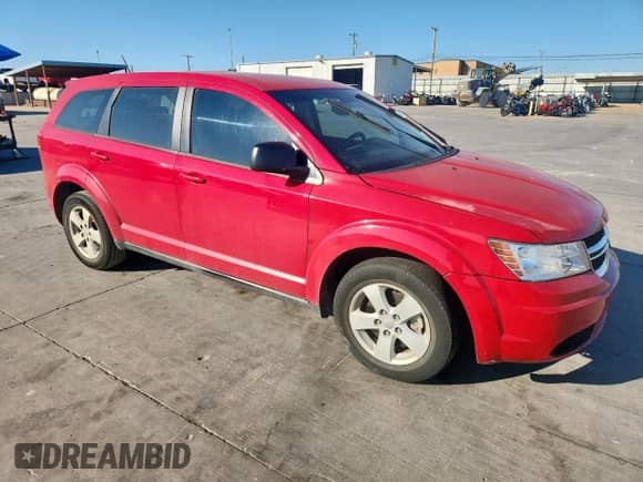 2013 Dodge Journey American Value с VIN 3C4PDCAB0DT555883, выставлен на аукционе Copart как лот 82441375 с пробегом 203 215 миль миль и Списание • Salvage title. История ставок и продаж доступна на DreamBid. Изображение 4.
