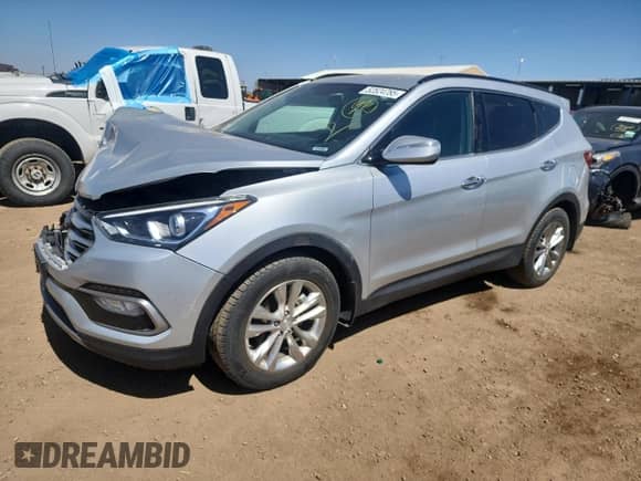 2018 Hyundai Santa Fe 2.0T с VIN 5XYZUDLA3JG537318, выставлен на аукционе Copart как лот 52524785 с пробегом 70 081 миль миль и Списание • Salvage title. История ставок и продаж доступна на DreamBid. Изображение 1.
