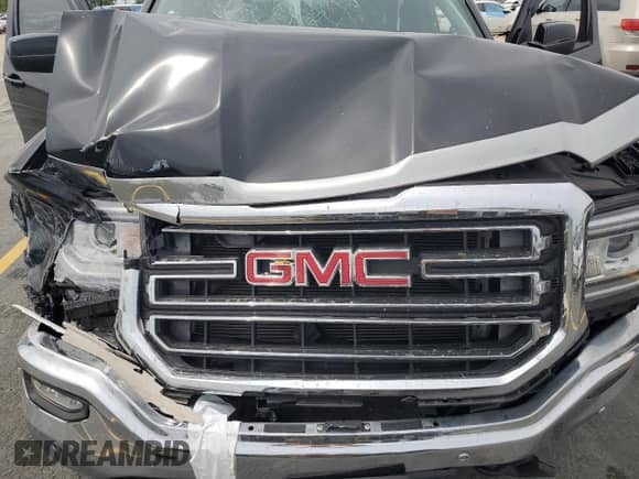 2016 GMC Sierra 1500 SLE с VIN 1GTN2MEC9GZ406553, выставлен на аукционе Copart как лот 60244055 с пробегом Не указан миль и Списание • Salvage title. История ставок и продаж доступна на DreamBid. Изображение 11.